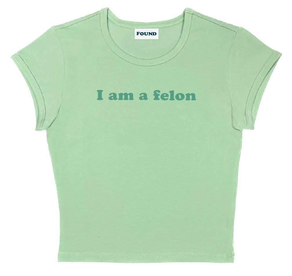 I am a felon baby tee