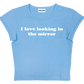 I love looking in the mirror baby tee