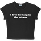 I love looking in the mirror baby tee