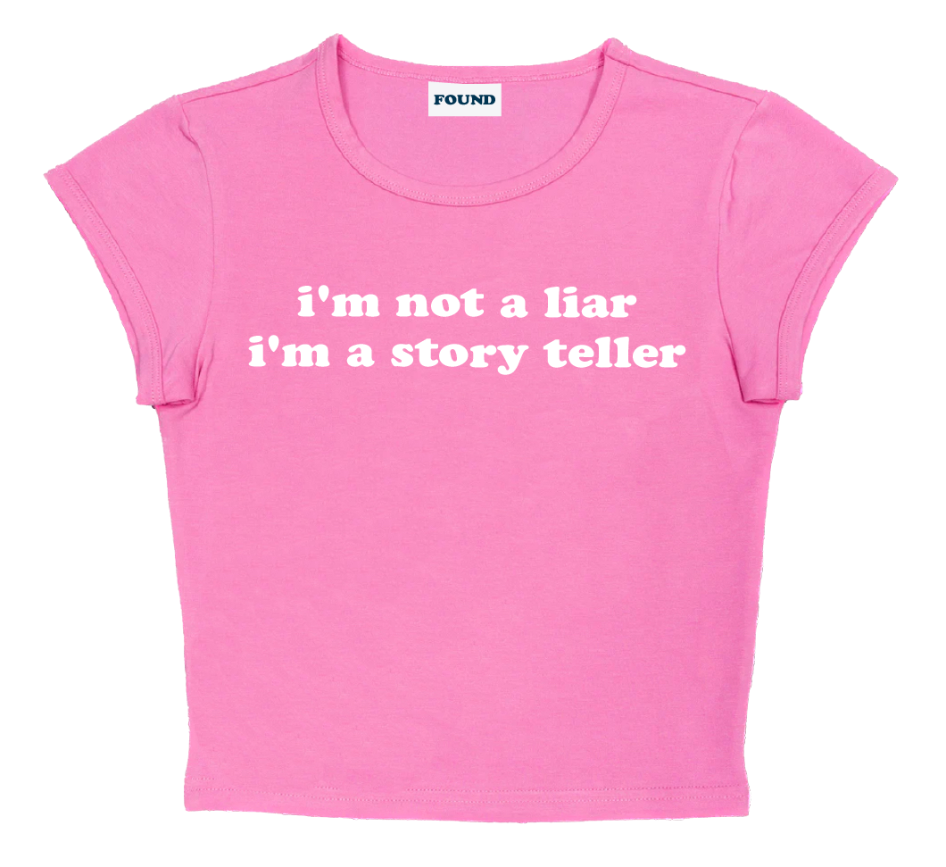 i'm not a liar i'm a story teller baby tee