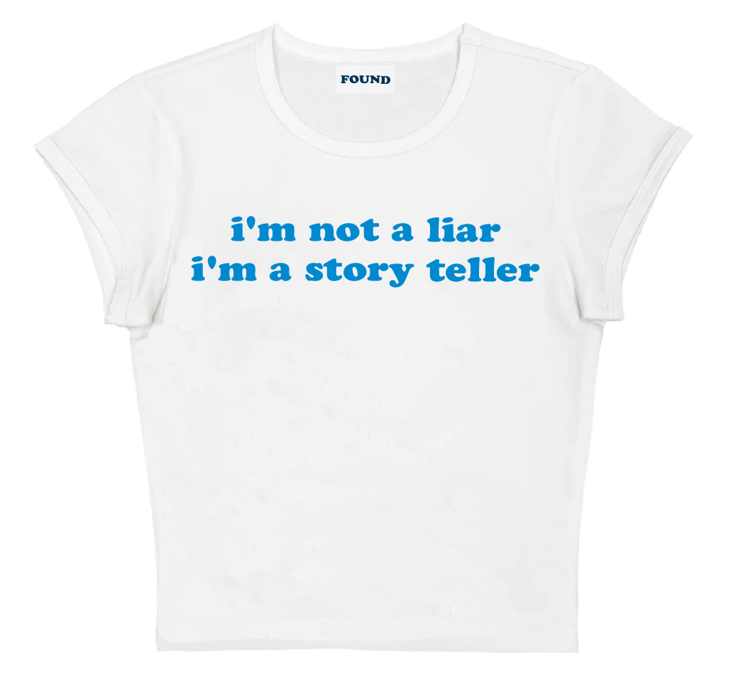 i'm not a liar i'm a story teller baby tee