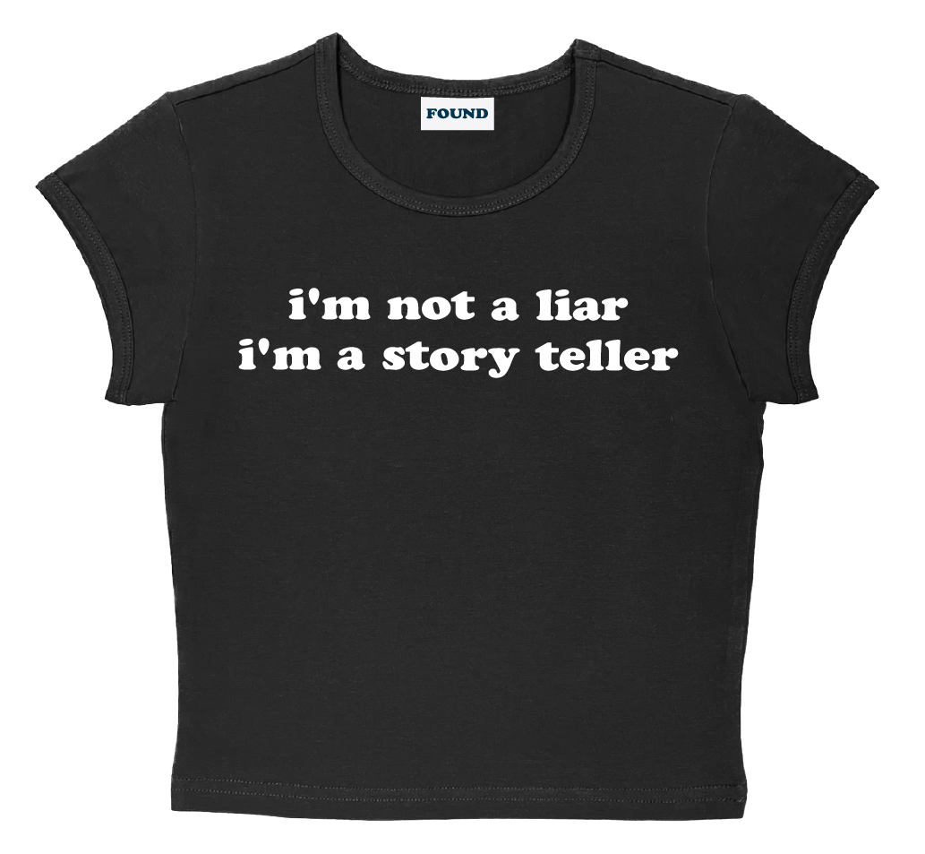 i'm not a liar i'm a story teller baby tee