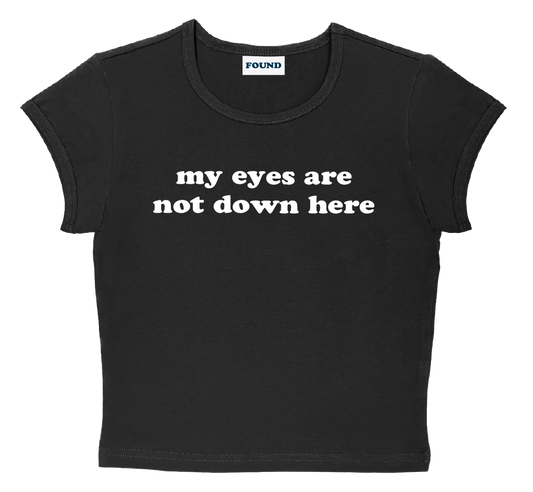 my eyes are not down here baby tee