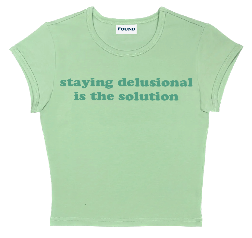 staying delusional is the solution baby tee