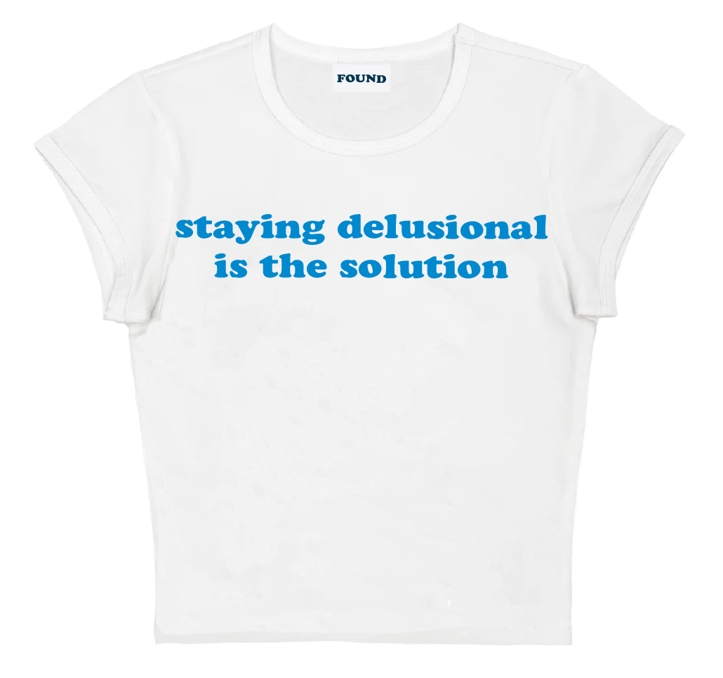 staying delusional is the solution baby tee